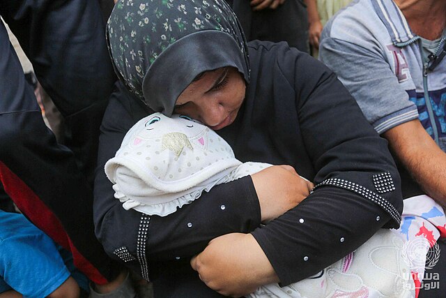 Mother cries for her 4-year-old daughter, who lost her life due to malnutrition and lack of treatment due to the war on Gaza, Gaza Strip